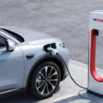 Modern electric vehicle charging at a public station in a city