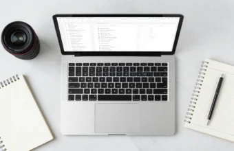 Amazon product listing optimization strategy on laptop with analytics and e-commerce accessories, representing modern seller tools and SEO services.