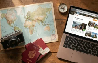 10 best travel blogs hero image with world map, camera, and passport