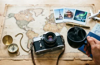 Notebook and map showing how to create a stress free travel itinerary